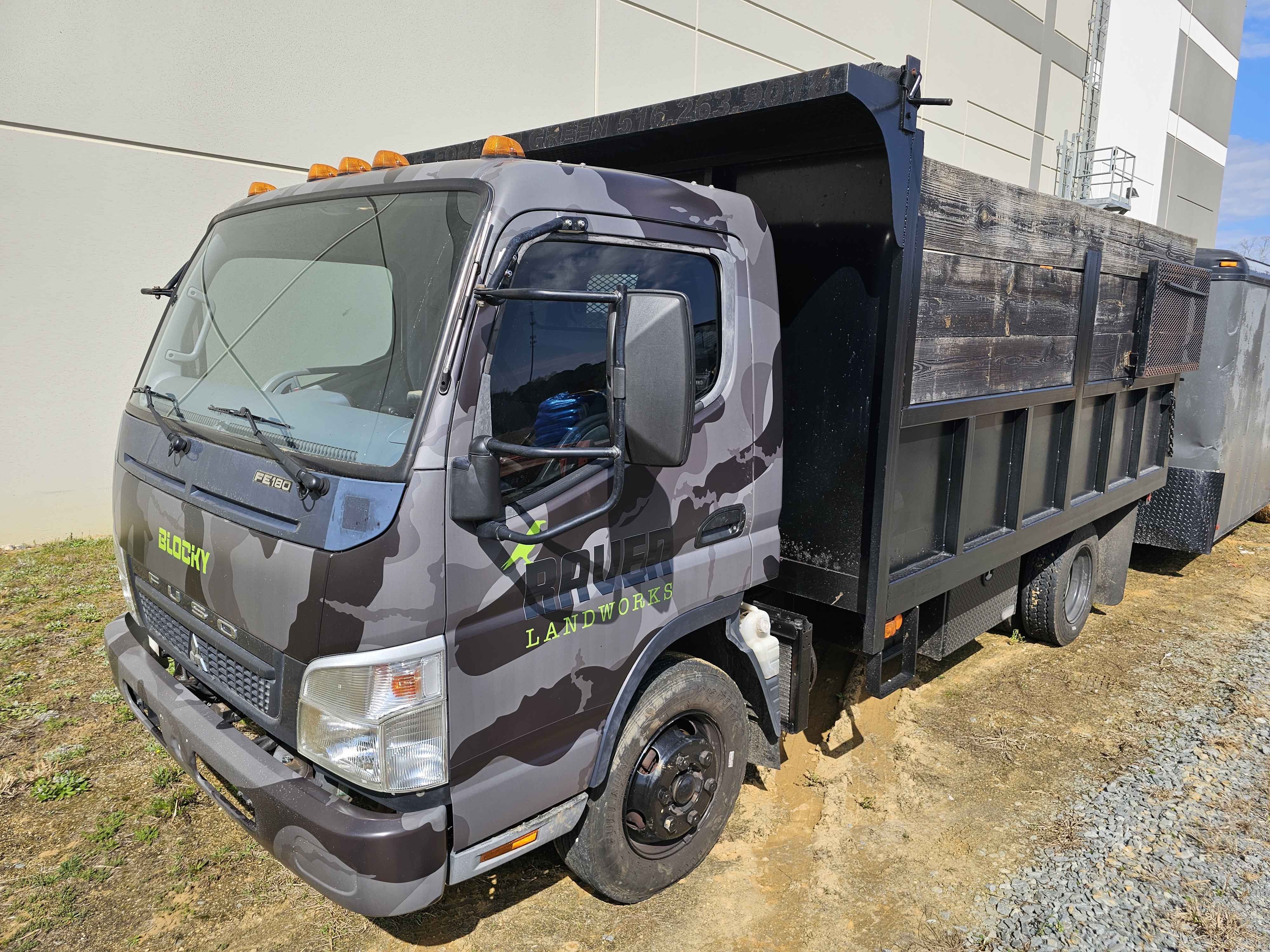 Custom contractor truck wrap by Coastal Graphics Group